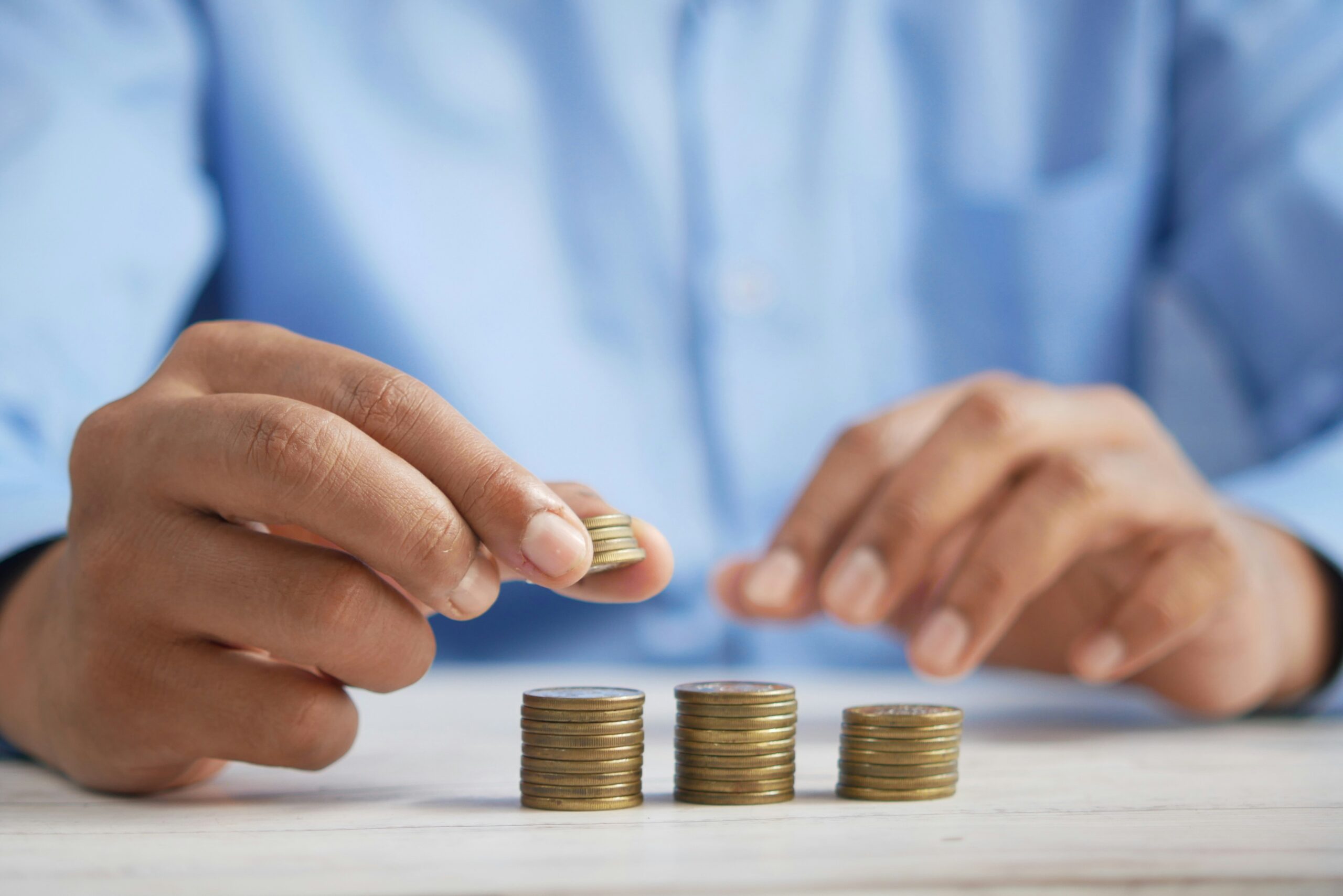 A person reviewing finances and a budget