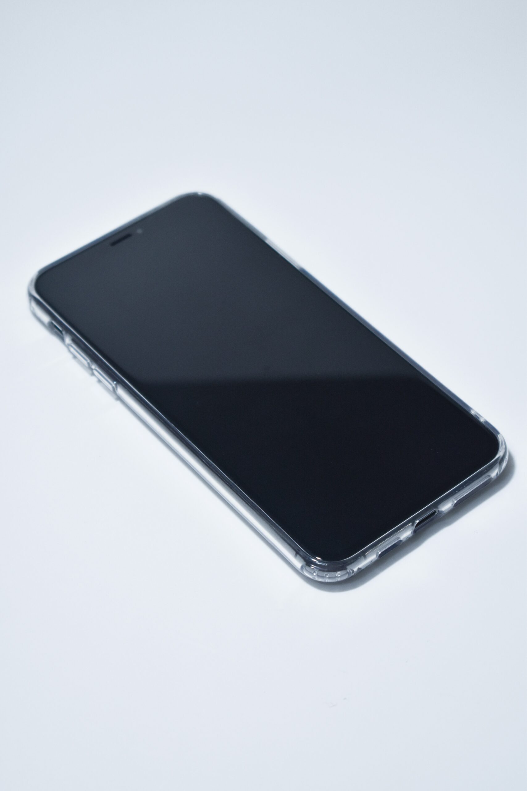 A smartphone near water droplets